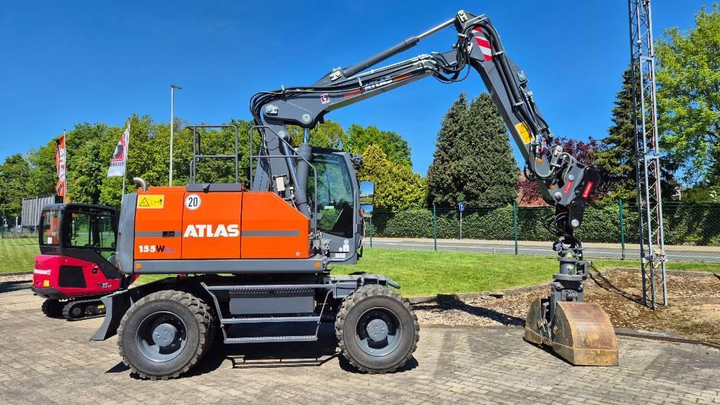 Atlas 155W mit OilQuick OQ65 Mobilbagger