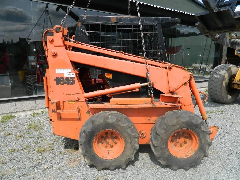 CASE 1845 Lietoti riteņu kompaktiekrāvēji