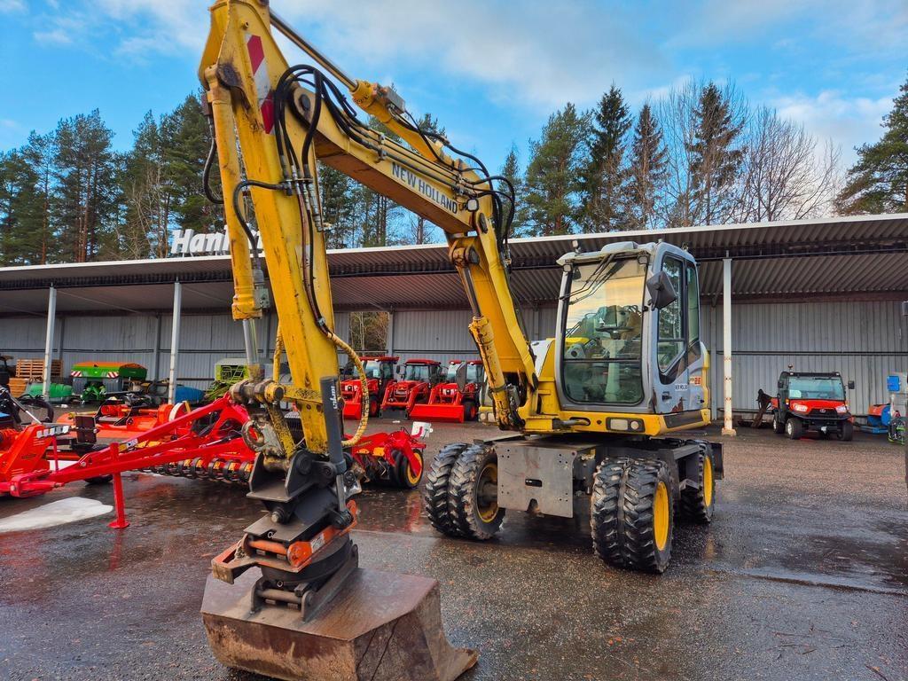 New Holland MH 2.6 Pale frontali e scavatori