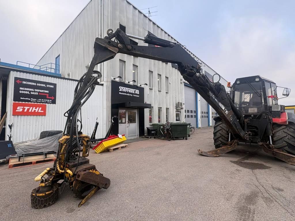 Huddig 960 C6 gårdsmaskin med skördar-aggregat Grävlastare