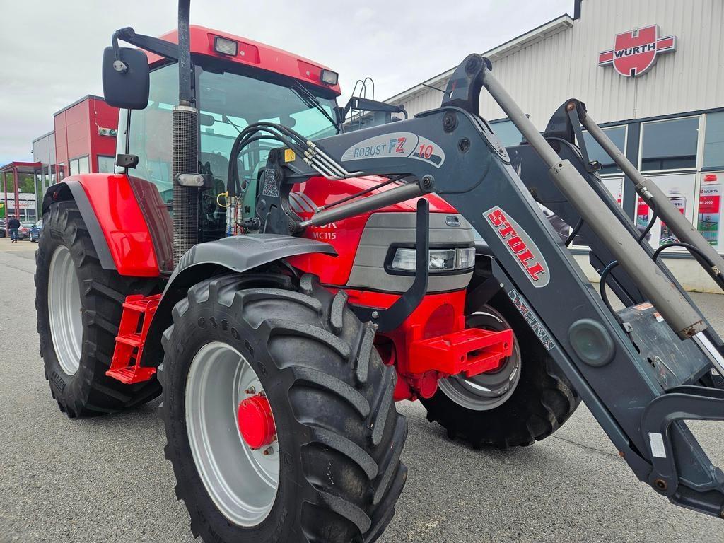MC CORMIC 115+STOLLFZ10 Trattori