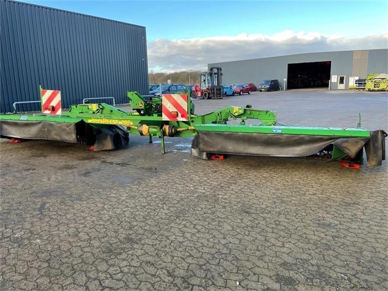 John Deere 388 med crimper Swathers