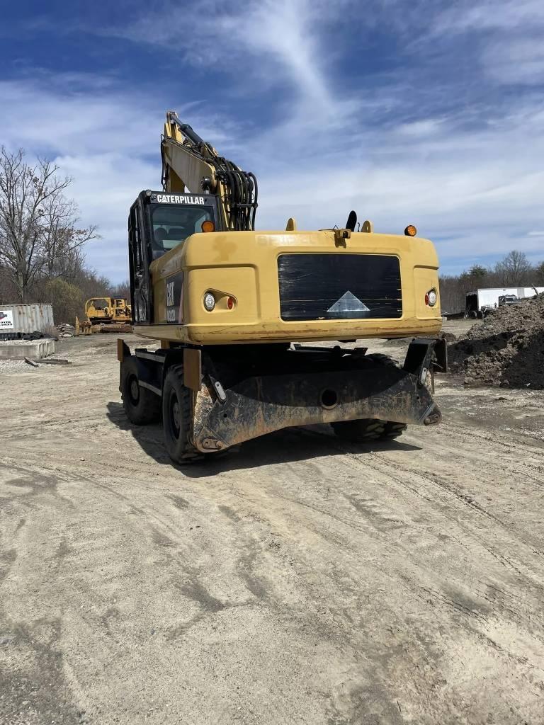 CAT M 322 D | 2010 | 5,100 hrs | INBOUND IQUIQUE Wheeled excavators